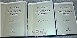 FIFTY SHADES OF GREY/DARKER/FREEDTRILOGY. COLLECTIBLE. HC, signed BY AUTHOR