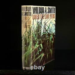 SIGNED Wilbur Smith WHEN THE LION FEEDS 1st UK edit 1964 Heineman Sean Courtney